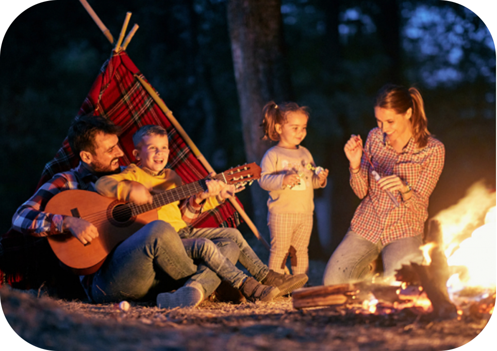 family at a camp fire
