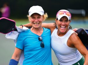 two friends at pickleball tournament